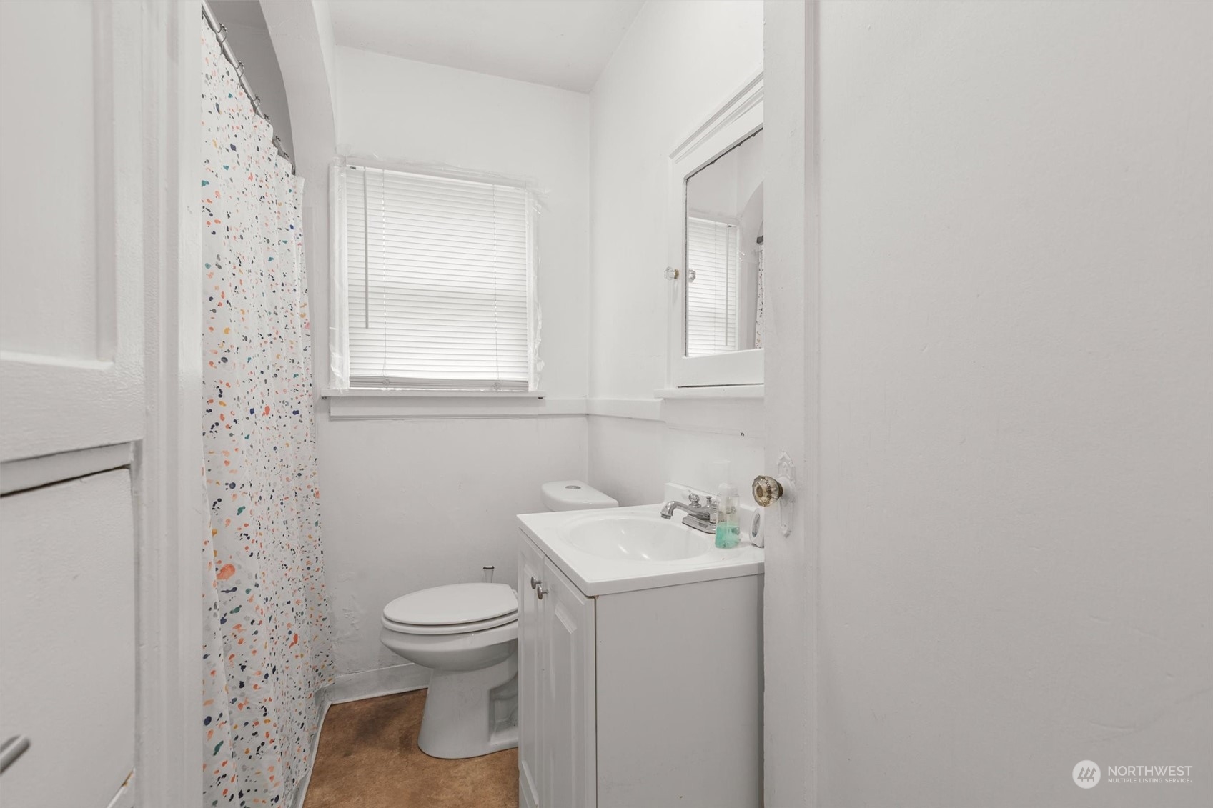 20925 Conway Frontage Road Mount Vernon, WA 98273 - Photo 31 of 40 a bathroom with a toilet sink and mirror
