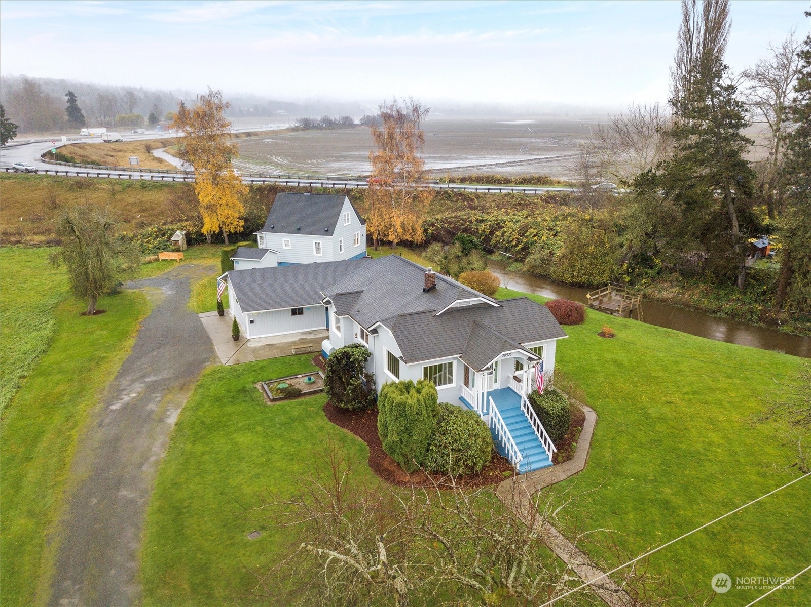 20925 Conway Frontage Road Mount Vernon, WA 98273 - Photo 32 of 40 an aerial view of residential houses with outdoor space