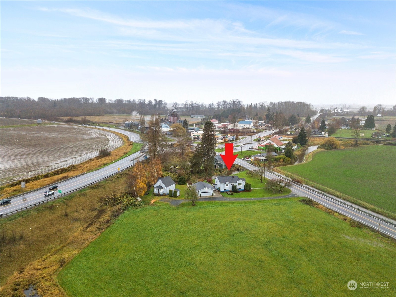 20925 Conway Frontage Road Mount Vernon, WA 98273 - Photo 40 of 40 a view of a lake with a mountain