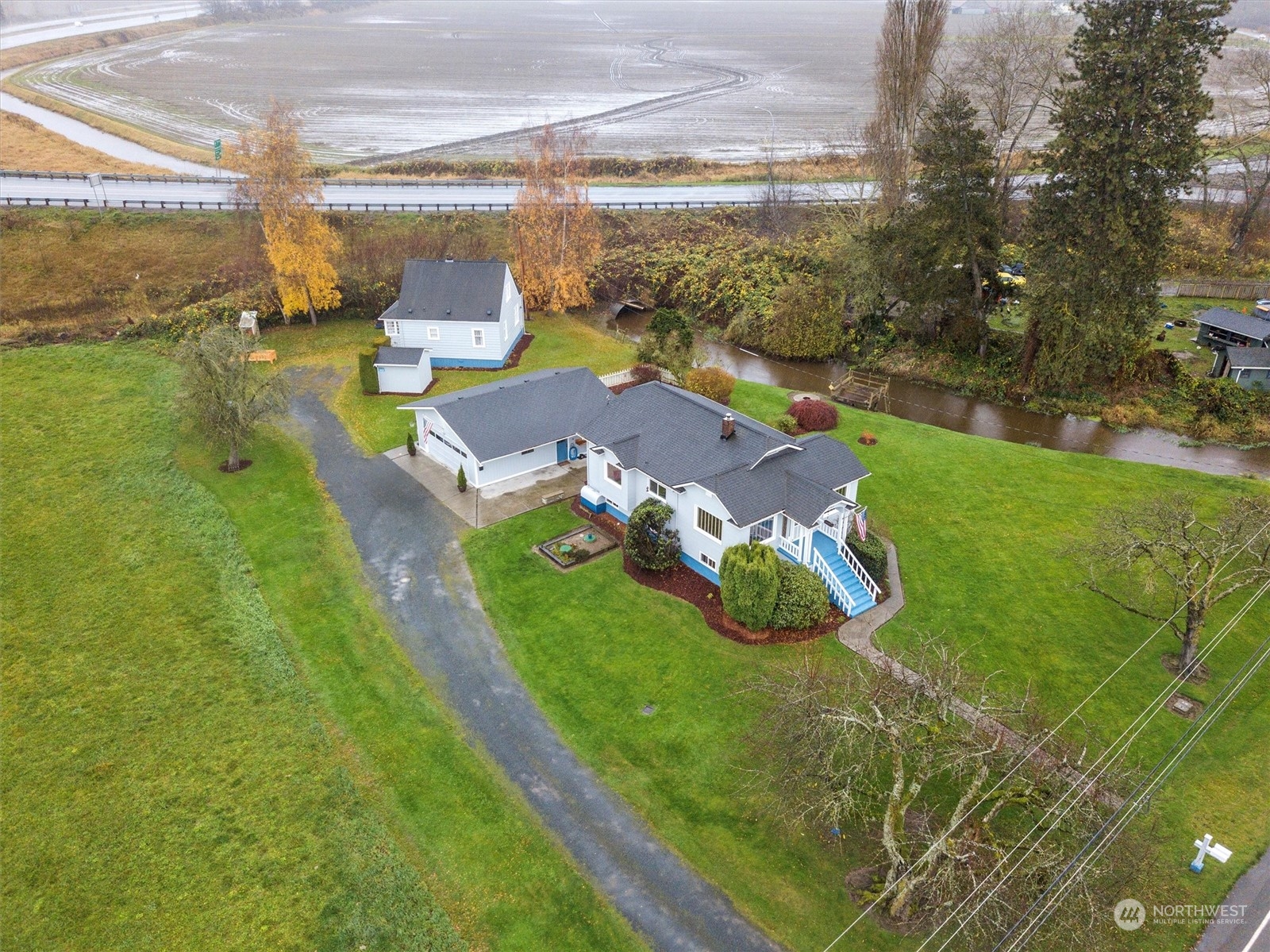 20925 Conway Frontage Road Mount Vernon, WA 98273 - Photo 4 of 40 a view of a garden from a building