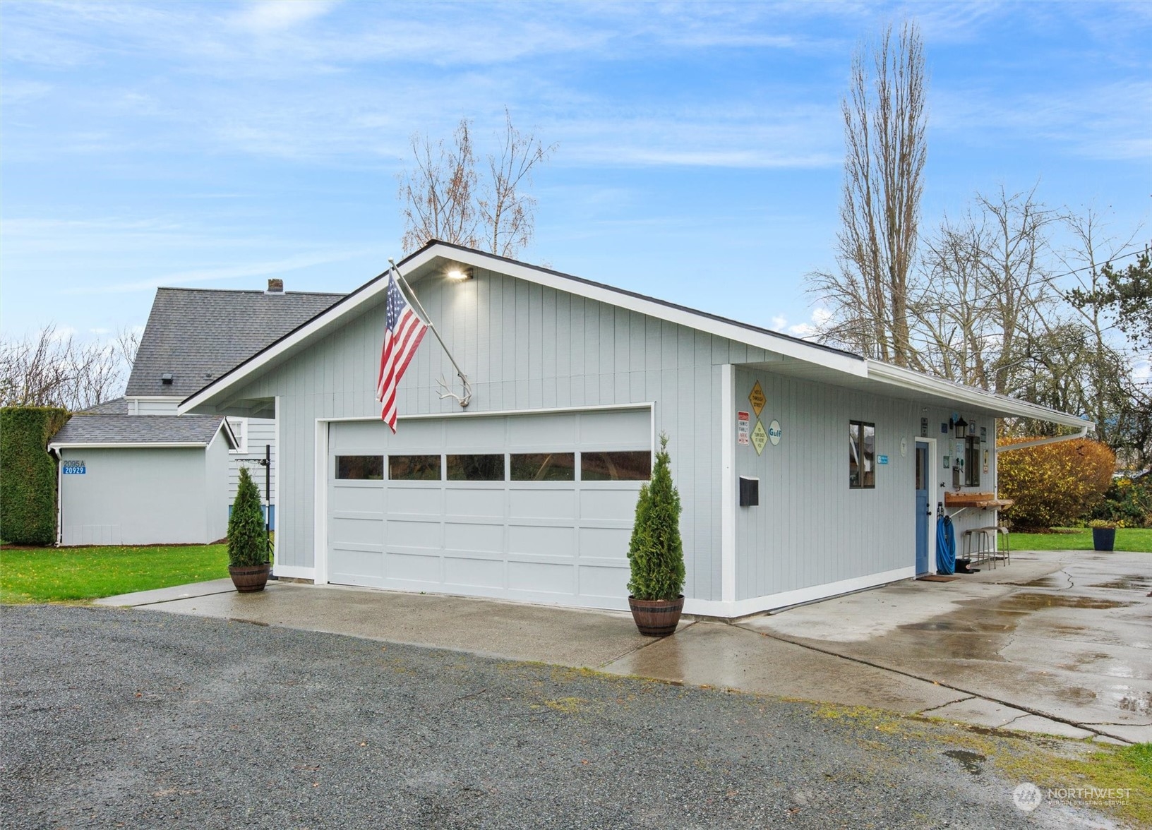 20925 Conway Frontage Road Mount Vernon, WA 98273 - Photo 6 of 40 a view of a house with a yard and garage