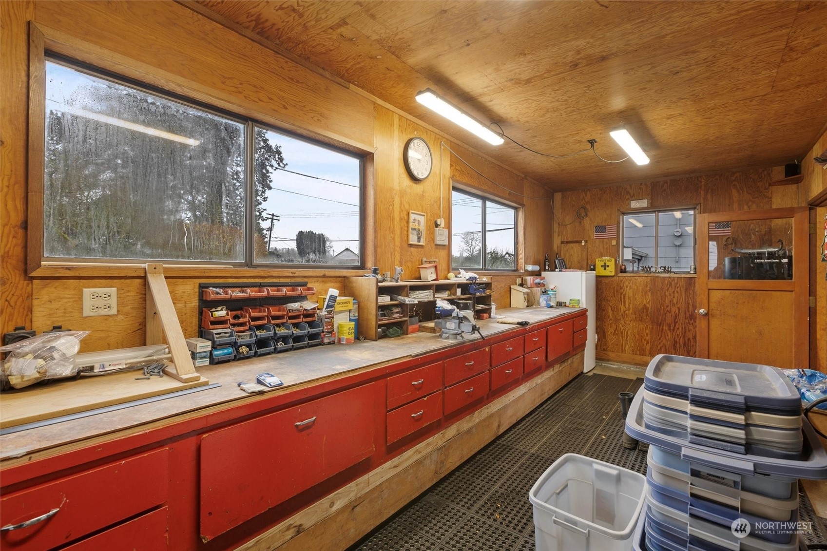 20925 Conway Frontage Road Mount Vernon, WA 98273 - Photo 7 of 40 a large kitchen with stainless steel appliances wooden floor and a large window