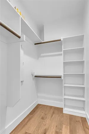 a view of an empty walk in closet
