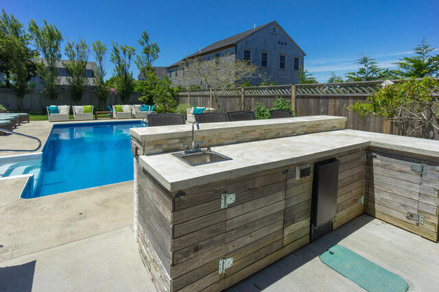 33 Bartlett Road Nantucket, MA 02554 - Photo 26 of 29 a view of swimming pool with a patio