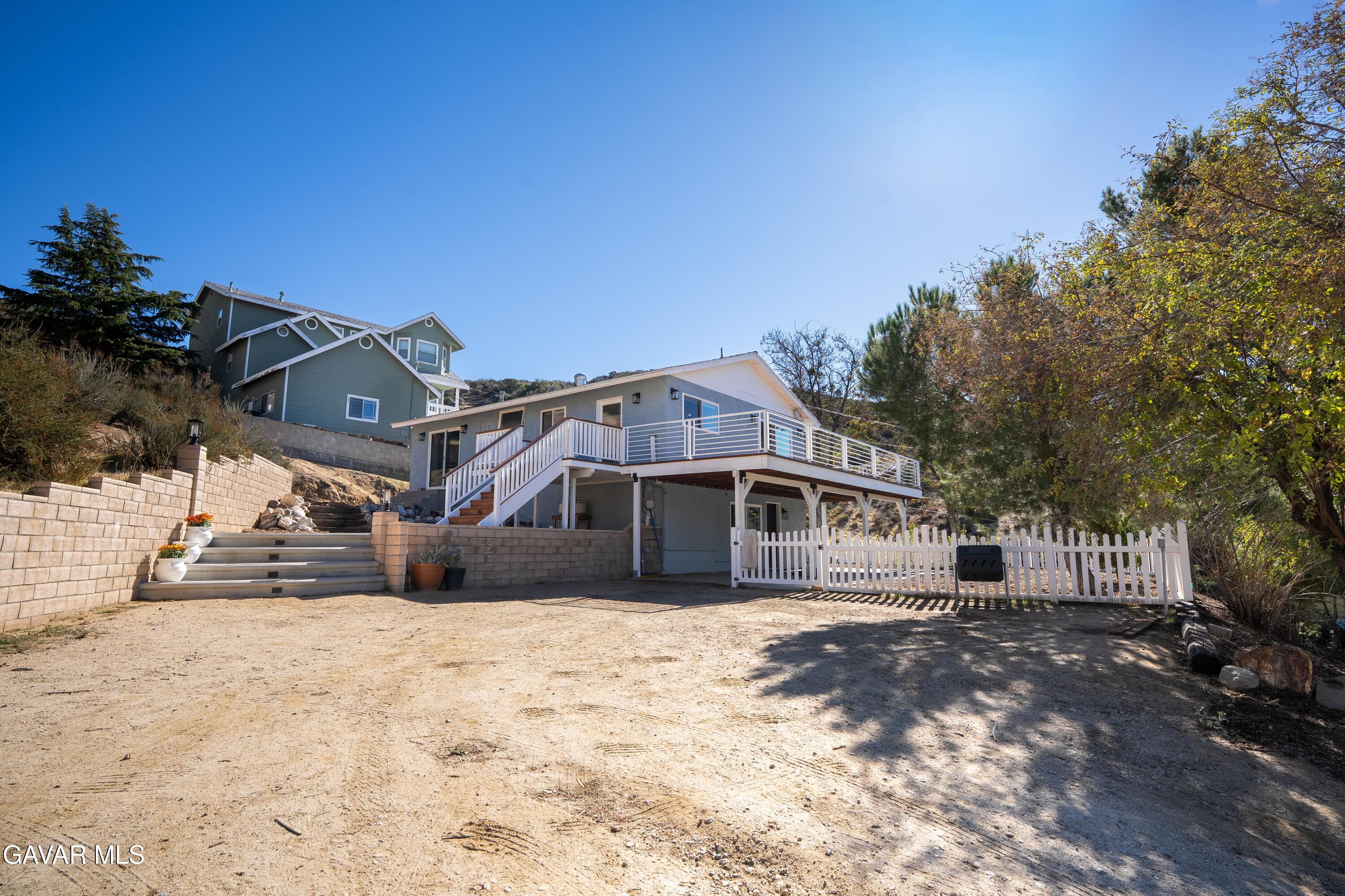 43379 Lookabout Road Lake Hughes, CA 93532 - Photo 13 of 50 a view of a house with a yard covered in snow