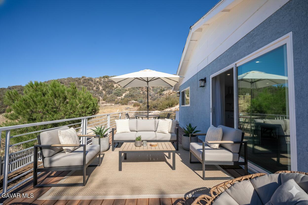43379 Lookabout Road Lake Hughes, CA 93532 - Photo 19 of 50 a view of balcony with furniture