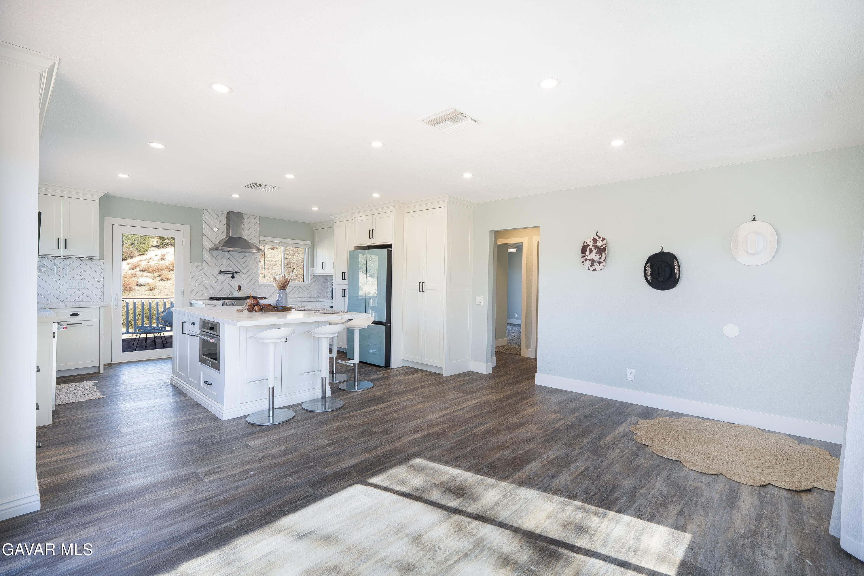 43379 Lookabout Road Lake Hughes, CA 93532 - Photo 3 of 50 a view of kitchen with cabinets and wooden floor