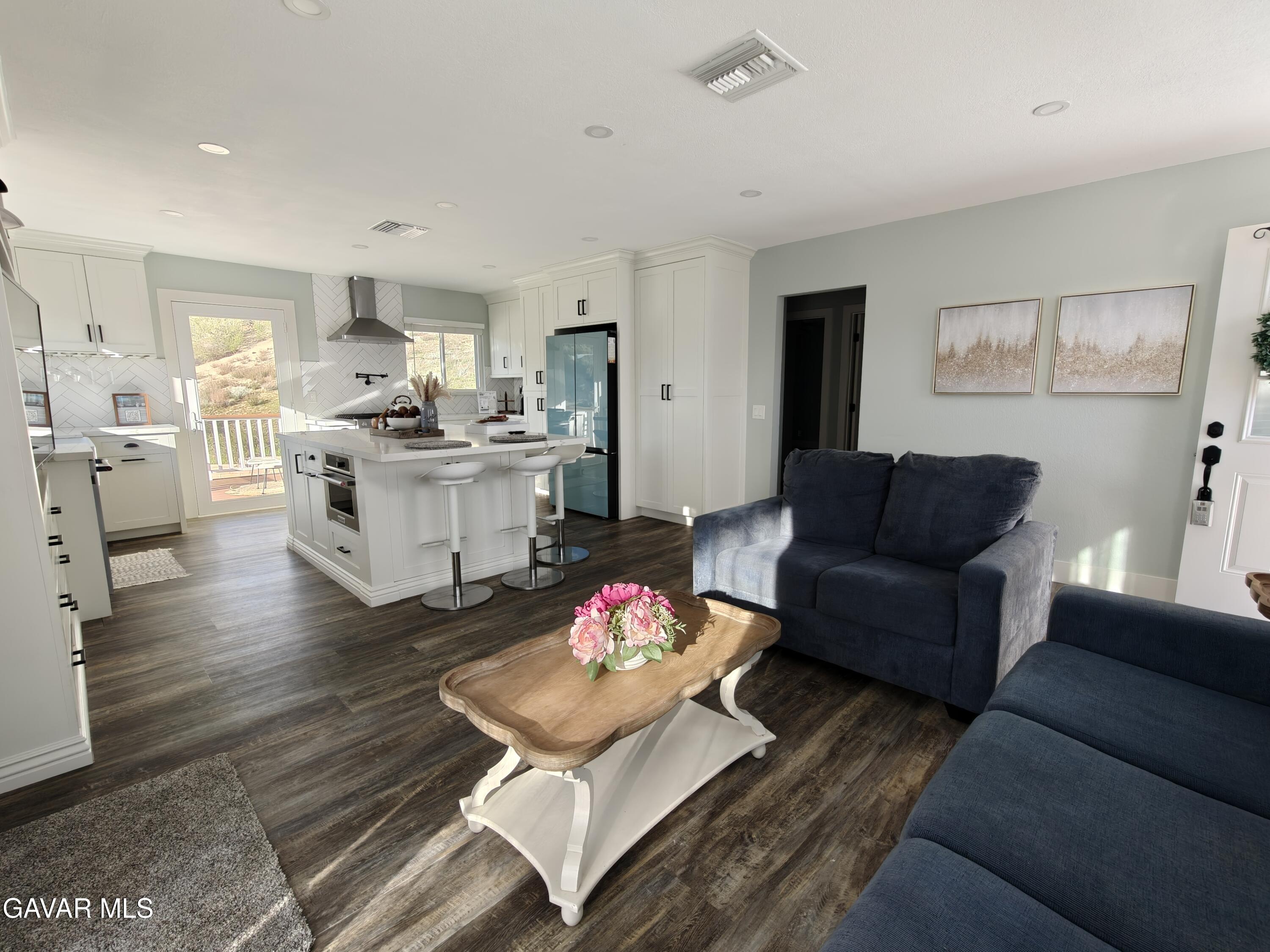43379 Lookabout Road Lake Hughes, CA 93532 - Photo 4 of 50 a living room with furniture kitchen view and wood floor