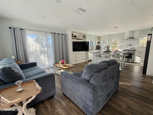 a view of balcony with furniture