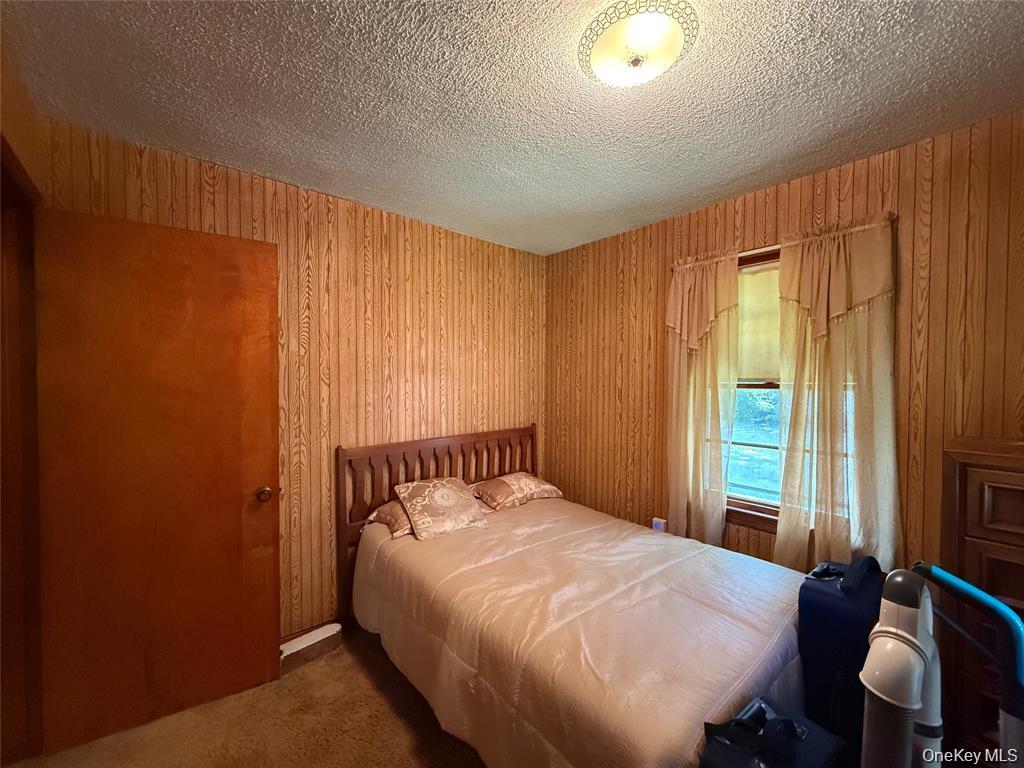 7 Dene Road Newburgh, NY 12550 - Photo 12 of 19 a bedroom with a bed and a window