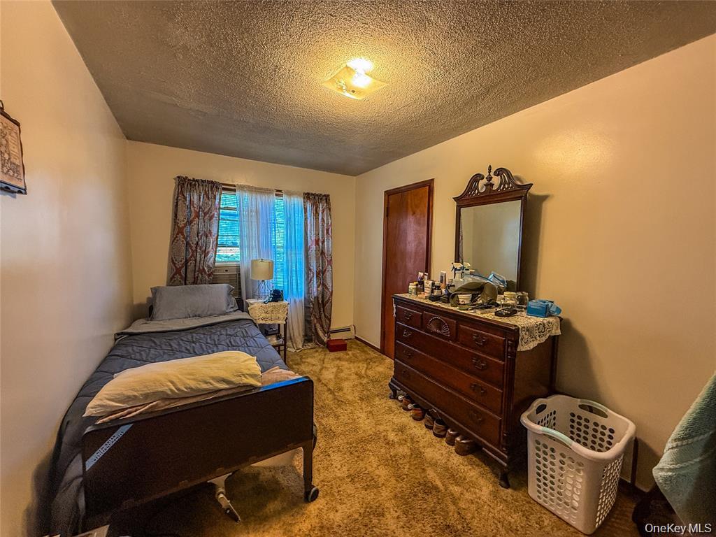 7 Dene Road Newburgh, NY 12550 - Photo 13 of 19 a bed room with furniture and a window