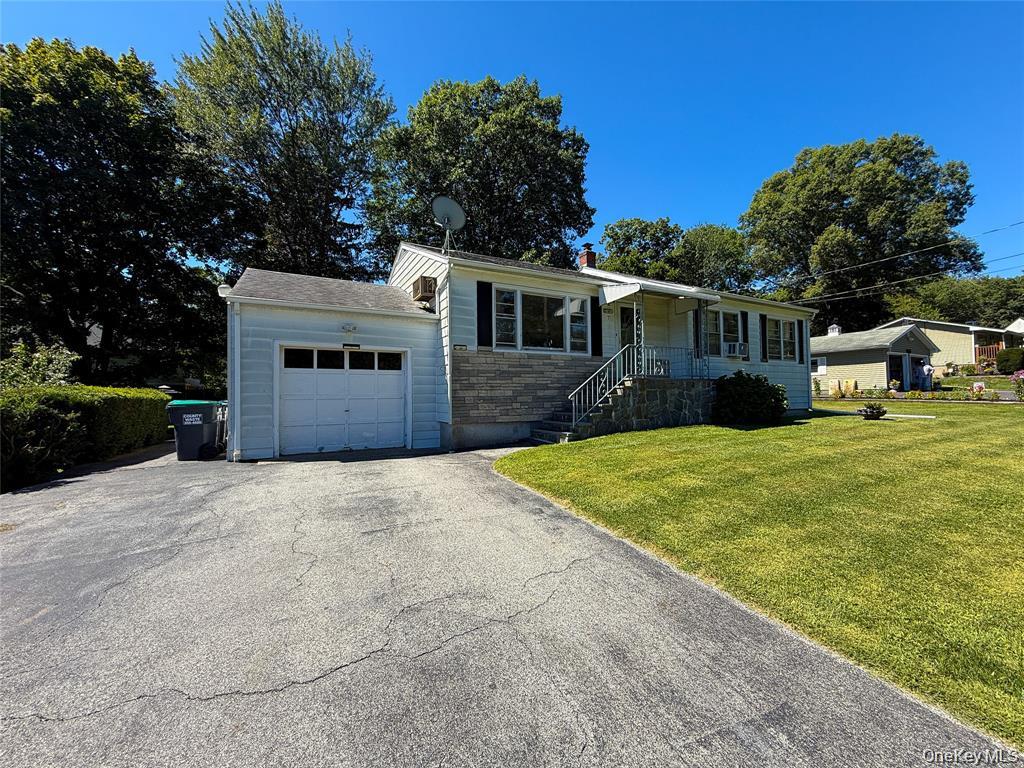 7 Dene Road Newburgh, NY 12550 - Photo 19 of 19 a front view of a house with yard and trees