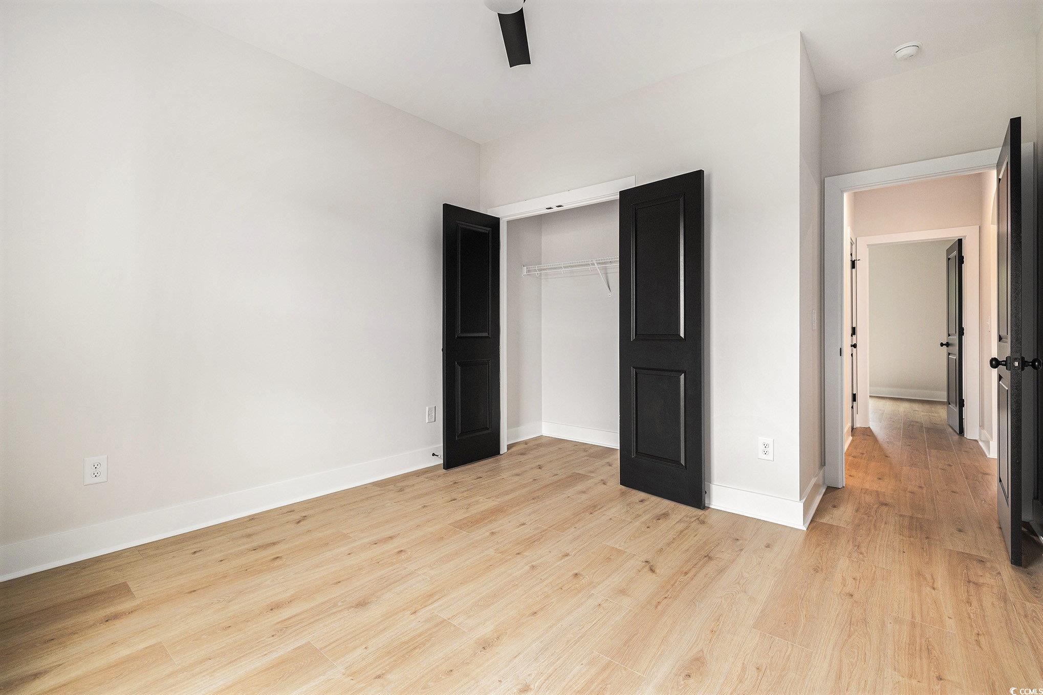 1052 Merritt Road Conway, SC 29526 - Photo 19 of 33 Unfurnished bedroom featuring light wood-style flo