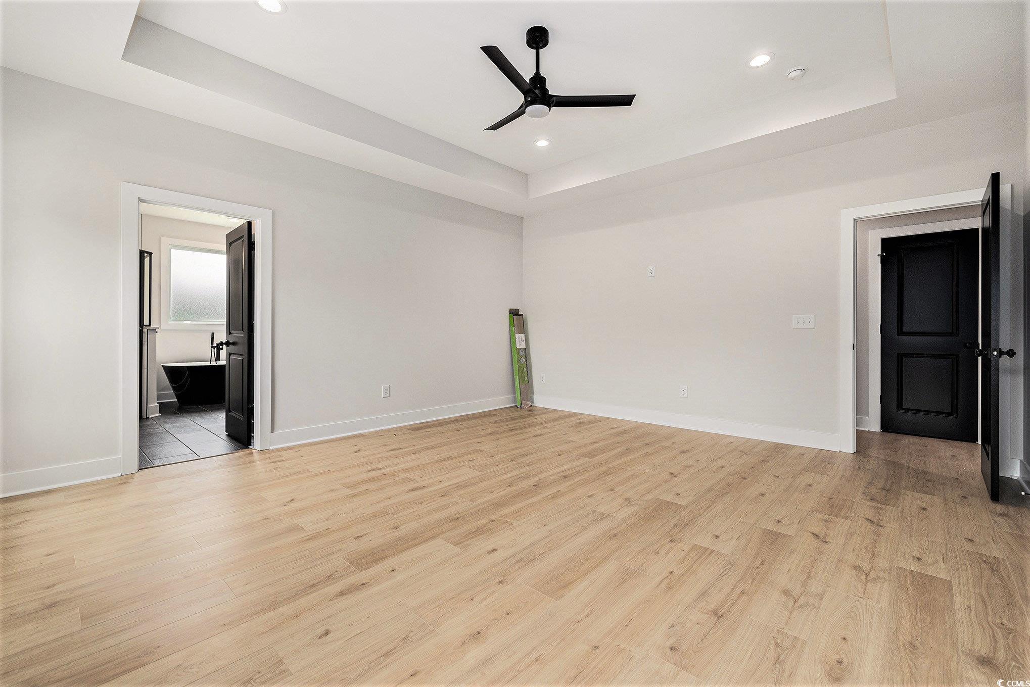 1052 Merritt Road Conway, SC 29526 - Photo 21 of 33 Unfurnished room featuring a tray ceiling, a ceili