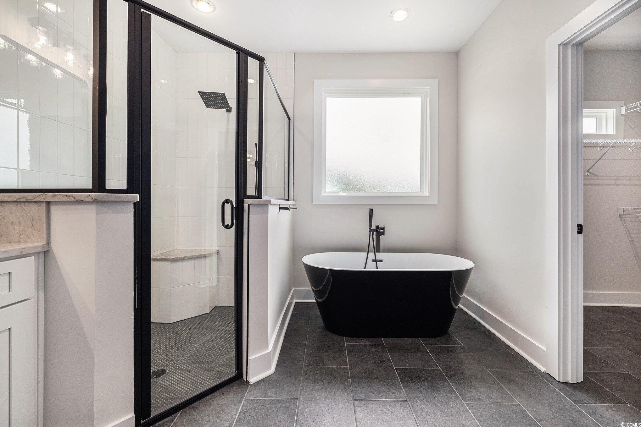 1052 Merritt Road Conway, SC 29526 - Photo 23 of 33 Bathroom featuring a shower stall, a spacious clos