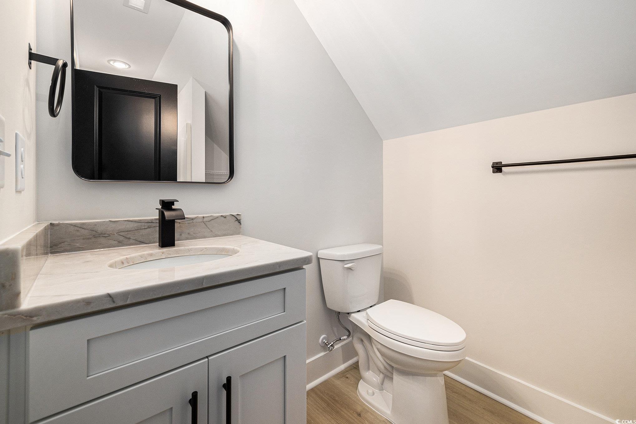 1052 Merritt Road Conway, SC 29526 - Photo 27 of 33 Bathroom featuring baseboards, wood finished floor