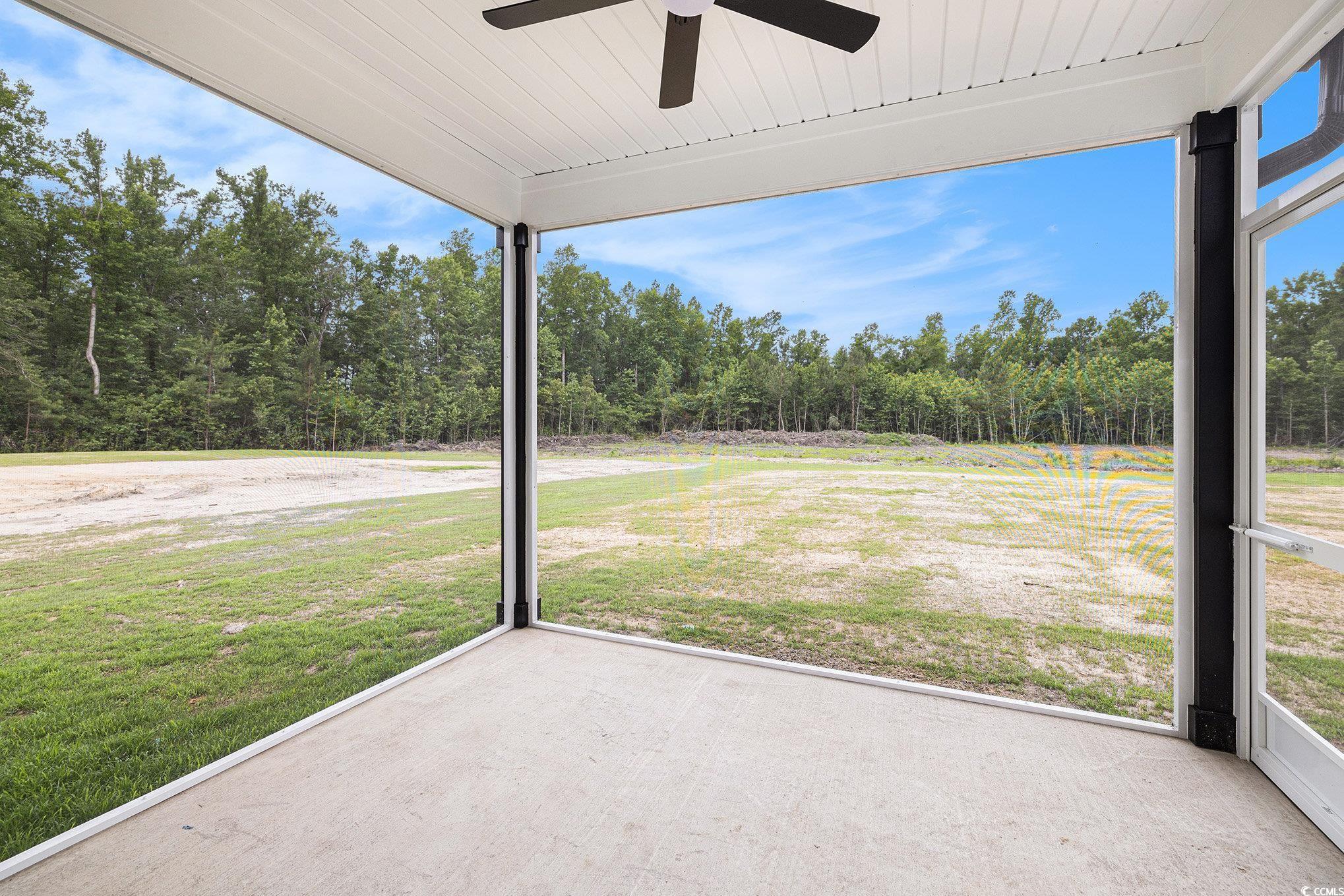 1052 Merritt Road Conway, SC 29526 - Photo 28 of 33 View of green lawn with ceiling fan and a patio