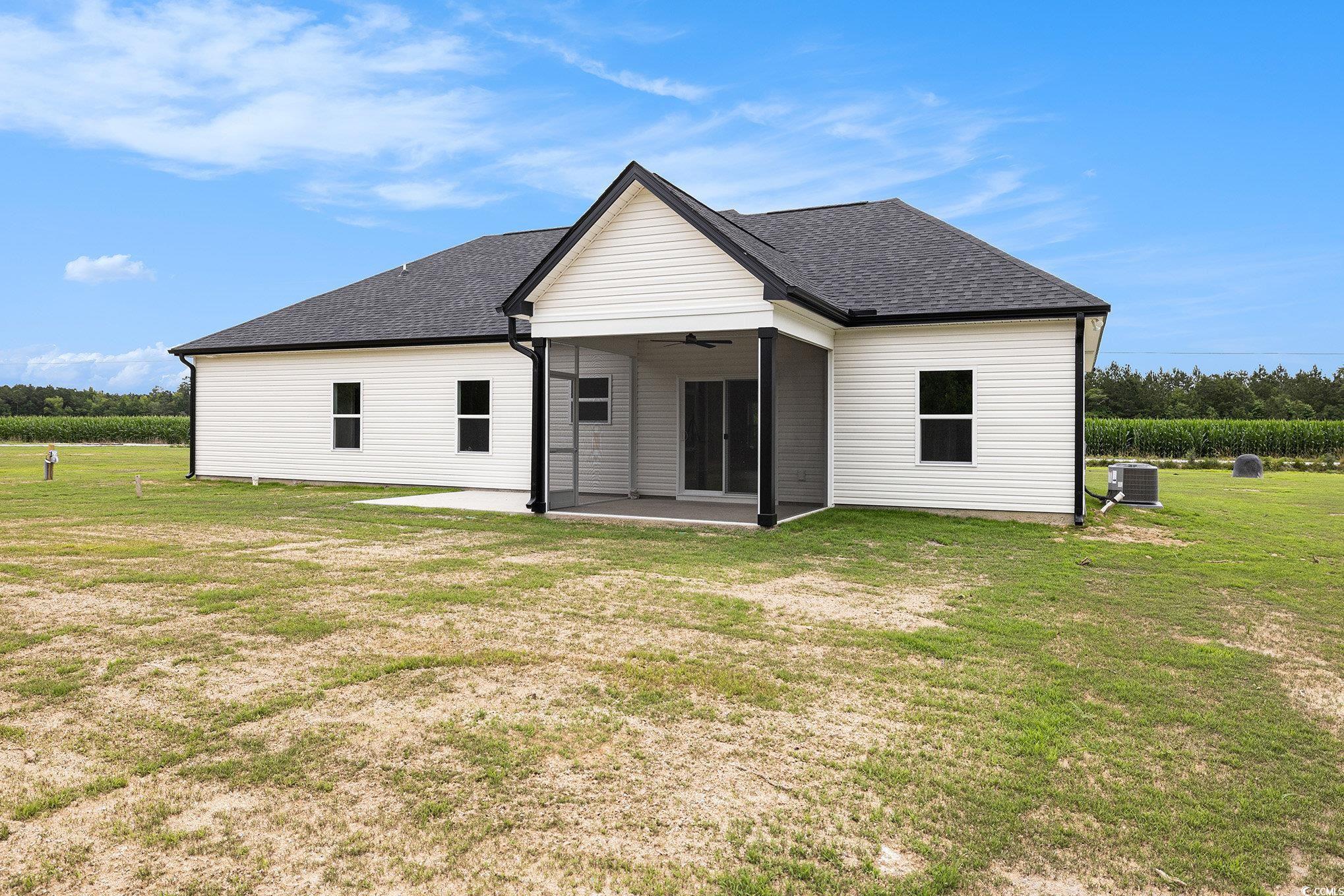 1052 Merritt Road Conway, SC 29526 - Photo 31 of 33 Back of house featuring a ceiling fan, a patio, a