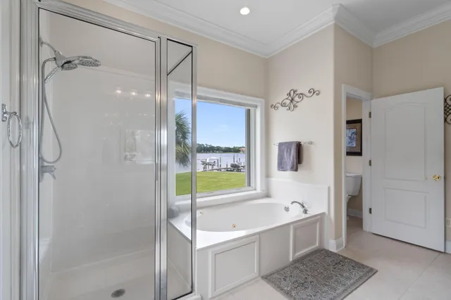 a bathroom with a sink double vanity and a mirror