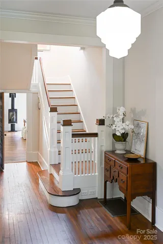 a workspace with furniture and wooden floor