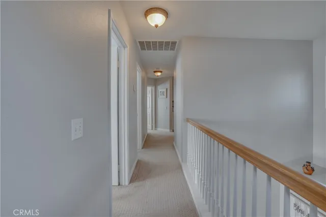 a bedroom with bed and a window