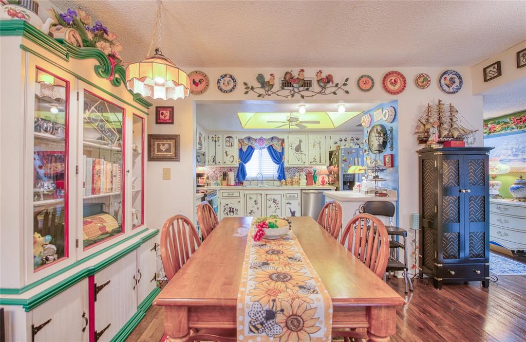 7040 Cognac Drive, Unit 3 New Port Richey, FL 34653 - Photo 11 of 31 a view of a dining room with furniture