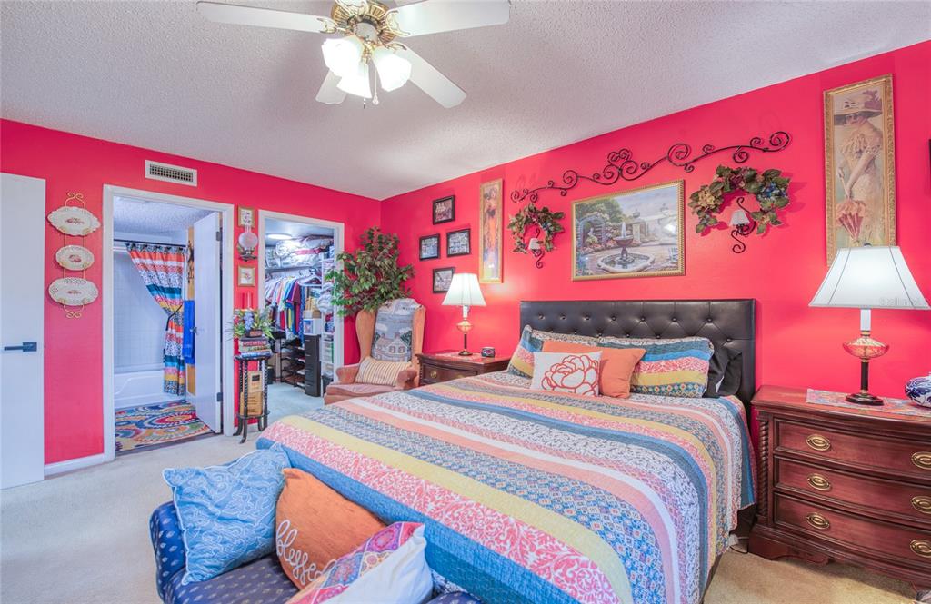 7040 Cognac Drive, Unit 3 New Port Richey, FL 34653 - Photo 25 of 31 a bedroom with furniture and wooden floor