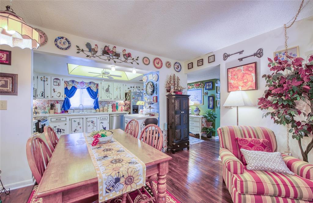 7040 Cognac Drive, Unit 3 New Port Richey, FL 34653 - Photo 31 of 31 a living room with furniture and wooden floor
