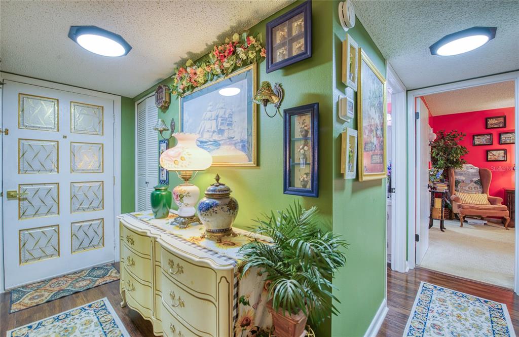 7040 Cognac Drive, Unit 3 New Port Richey, FL 34653 - Photo 8 of 31 a view of living room with furniture and a potted plant
