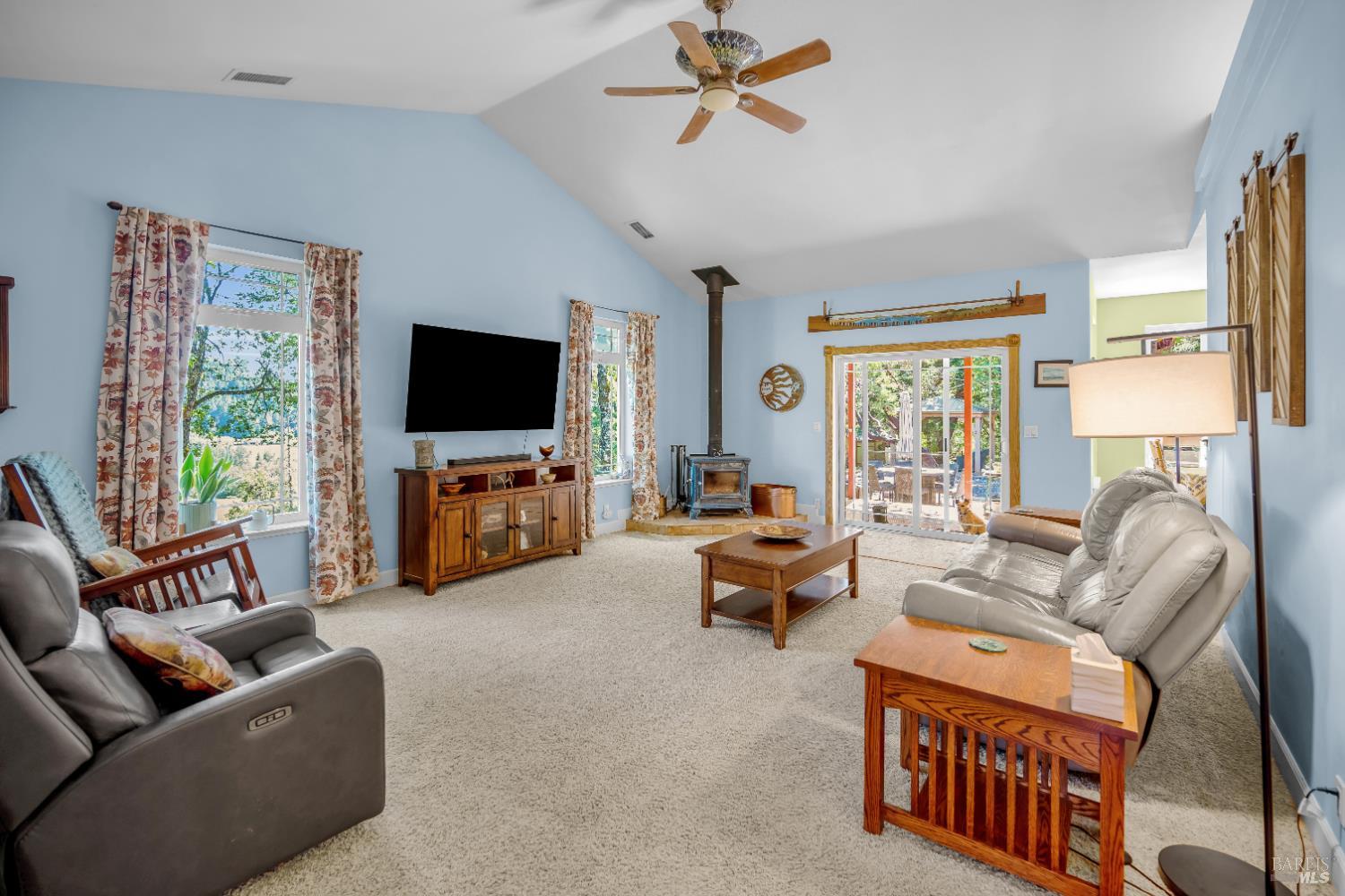 3970 Canyon Road Willits, CA 95490 - Photo 10 of 73 a living room with furniture and a flat screen tv