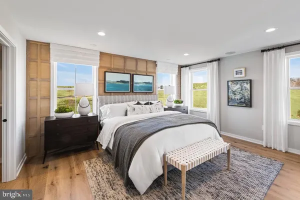 a bed room with a bed and a window