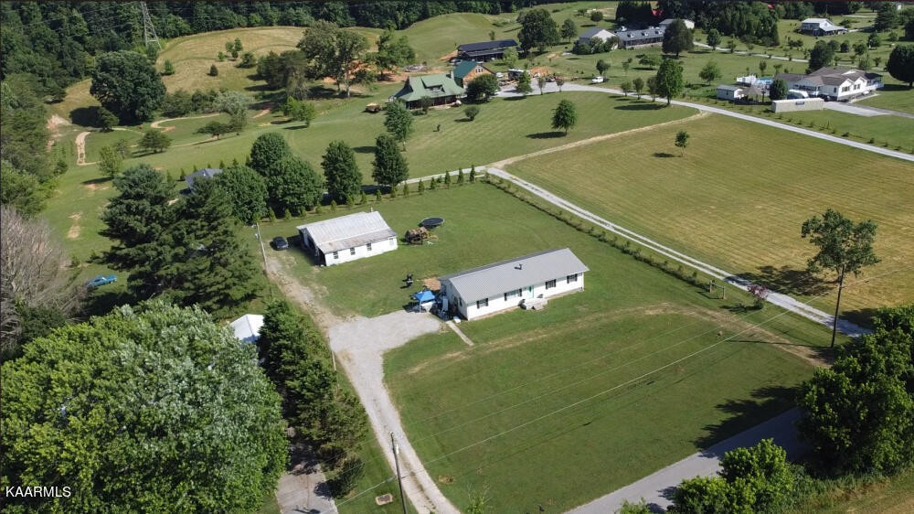 7710 Munsey Road Corryton, TN 37721 - Photo 2 of 19 an aerial view of a tennis court