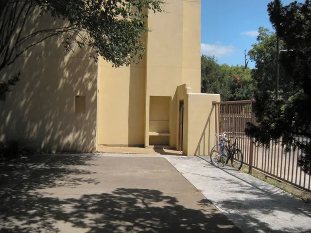 a view of a backyard of the house