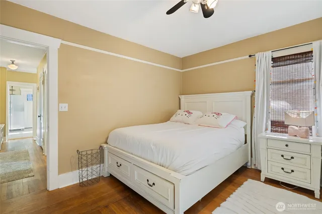 a large white bed in a white room