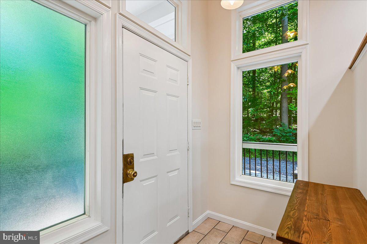 3633 Patuxent River Road Davidsonville, MD 21035 - Photo 16 of 85 Entry Foyer with Tile Flooring and Transom Windows