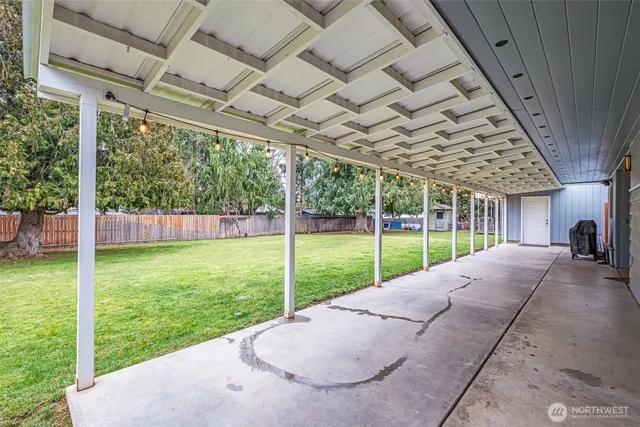 a view of swimming pool with a backyard