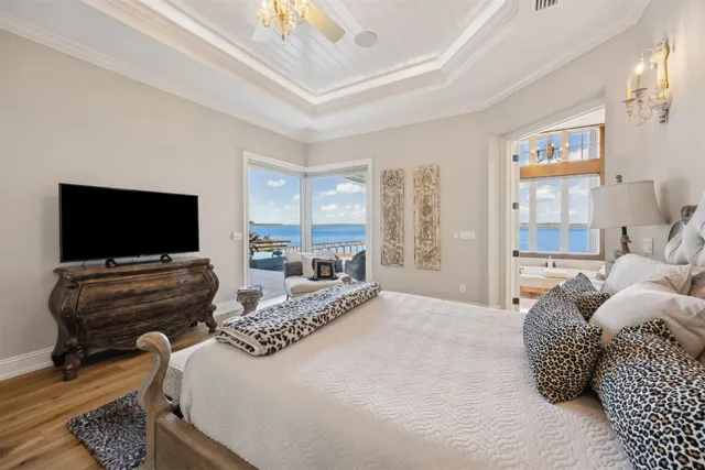 a living room with fireplace furniture and a flat screen tv