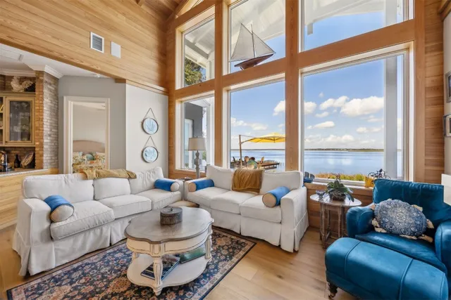 a view of a balcony with wooden floor