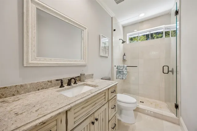 a view of a house with a yard and plants