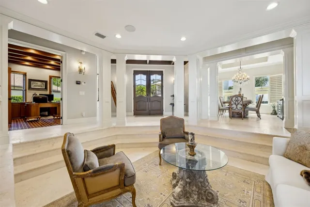a kitchen with granite countertop a stove top oven and cabinets