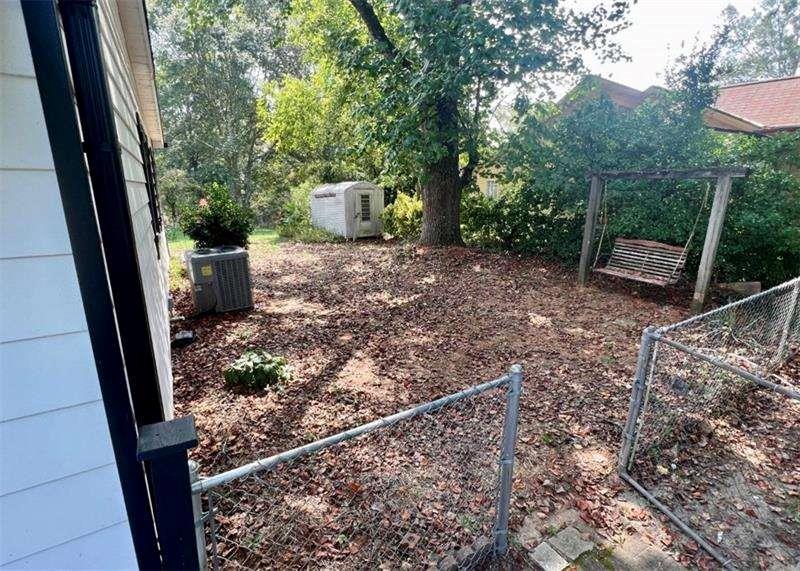 3521 Clay Road Southwest Austell, GA 30106 - Photo 12 of 13 a view of backyard with outdoor seating and plants