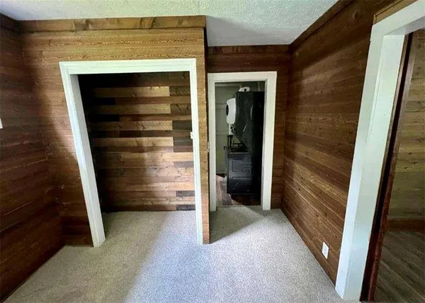 a view of an empty room to rooms