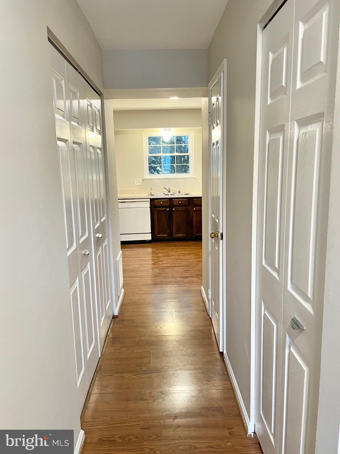 14831 Basingstoke Loop Centreville, VA 20120 - Photo 11 of 36 Hallway--Doors to Half Bath, Laundry, Coat Closet