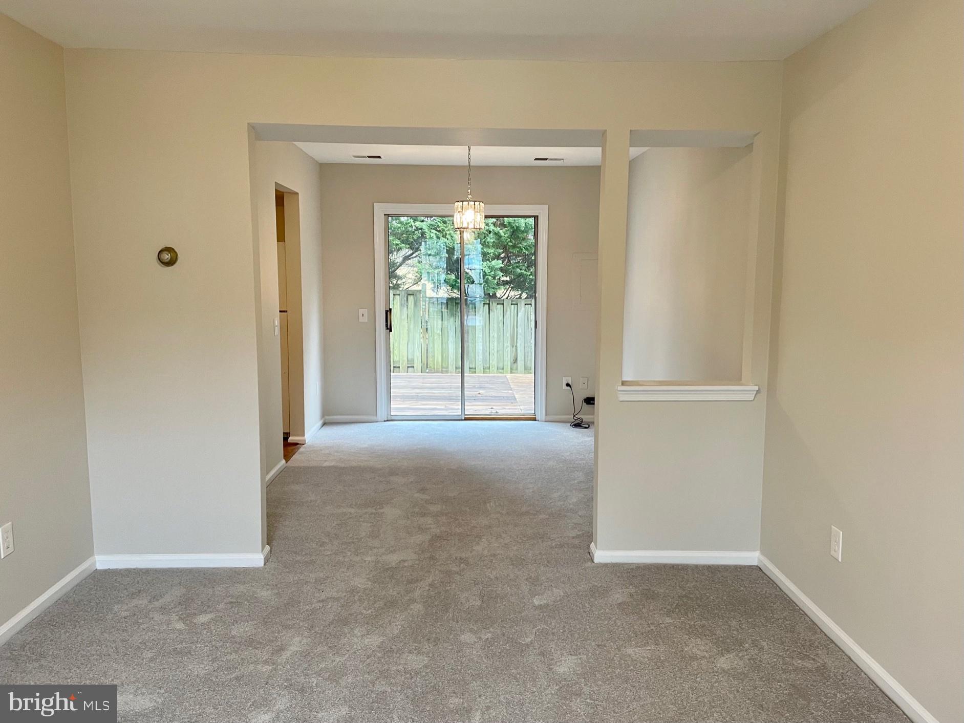 14831 Basingstoke Loop Centreville, VA 20120 - Photo 5 of 36 Living Room to Dining Room