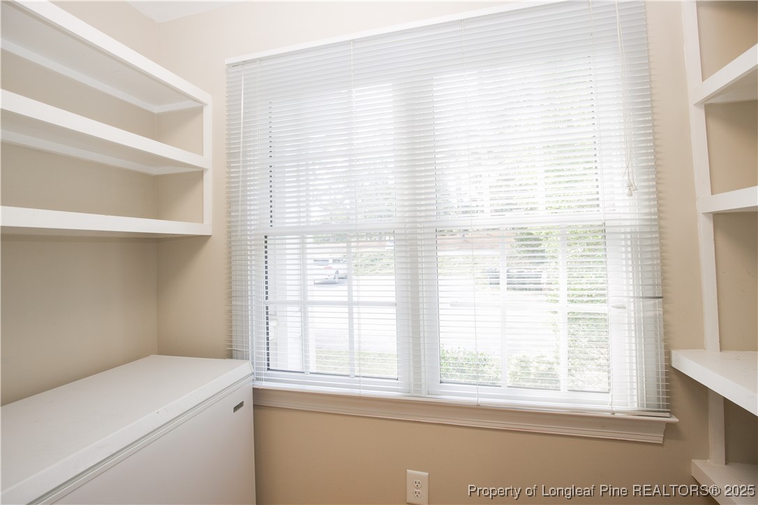 175 Knoll Road Southern Pines, NC 28387 - Photo 11 of 50 a utility room with a window