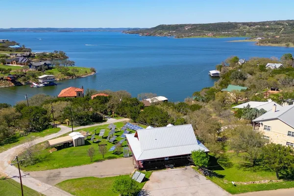 an aerial view of a house with a garden