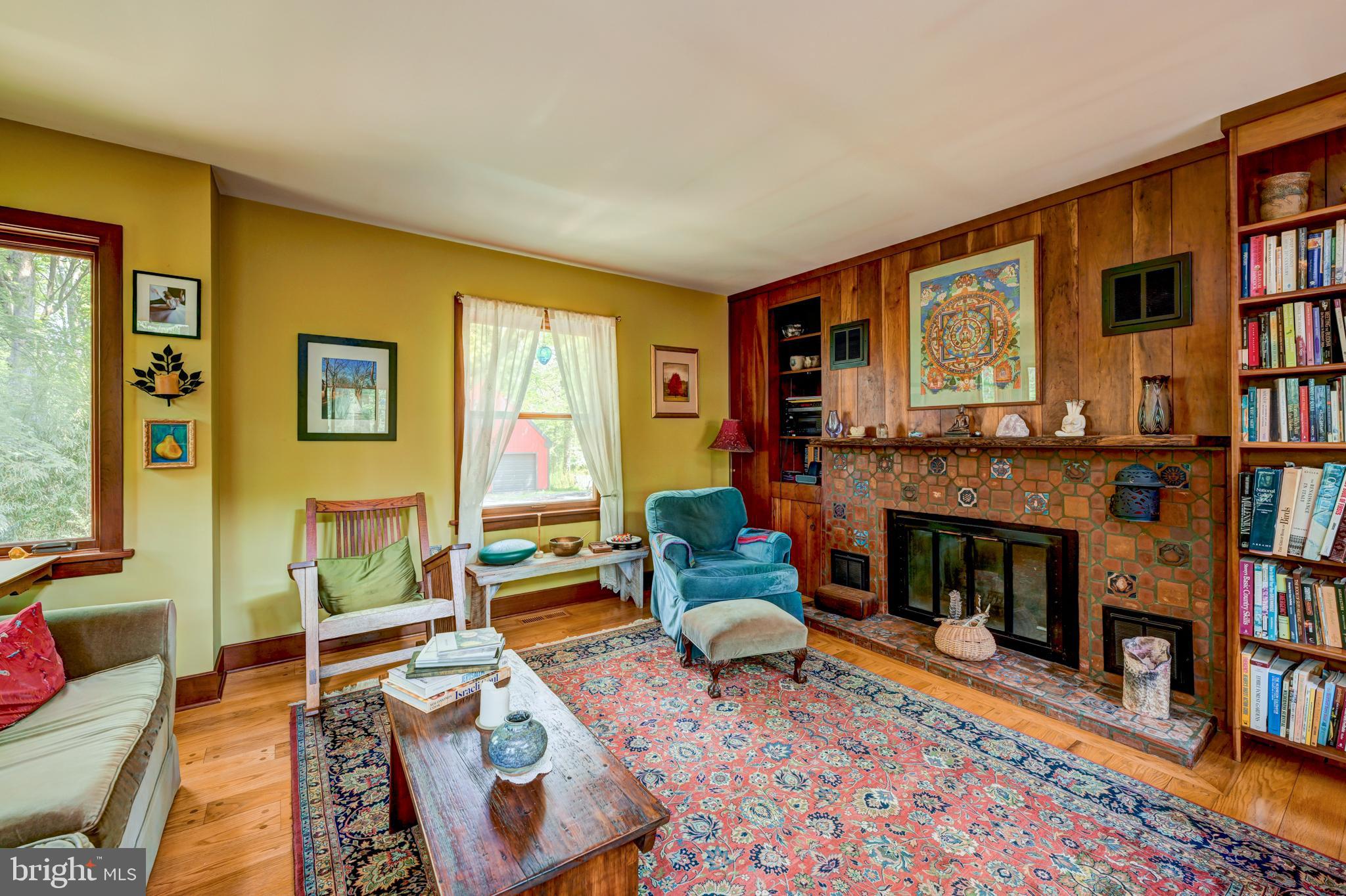 5613 Point Pleasant Pike Doylestown, PA 18902 - Photo 11 of 39 a living room with furniture and a fireplace