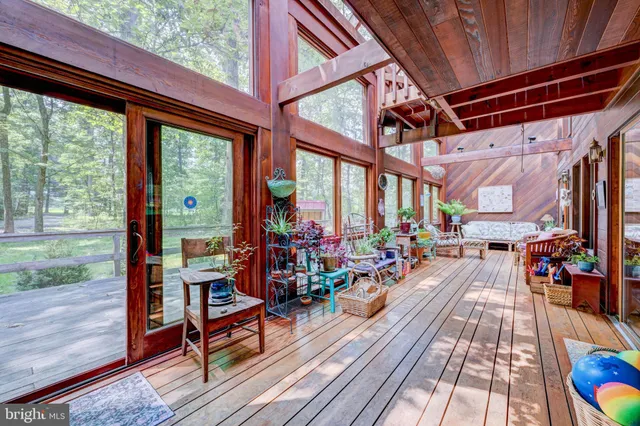 a outdoor space with wooden floor and outdoor seating