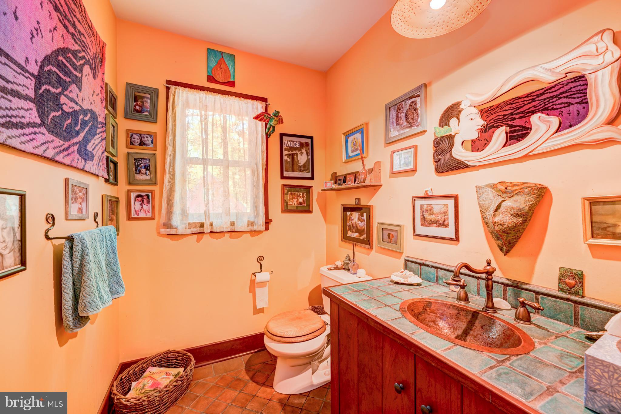 5613 Point Pleasant Pike Doylestown, PA 18902 - Photo 17 of 39 a bathroom with a sink and a mirror