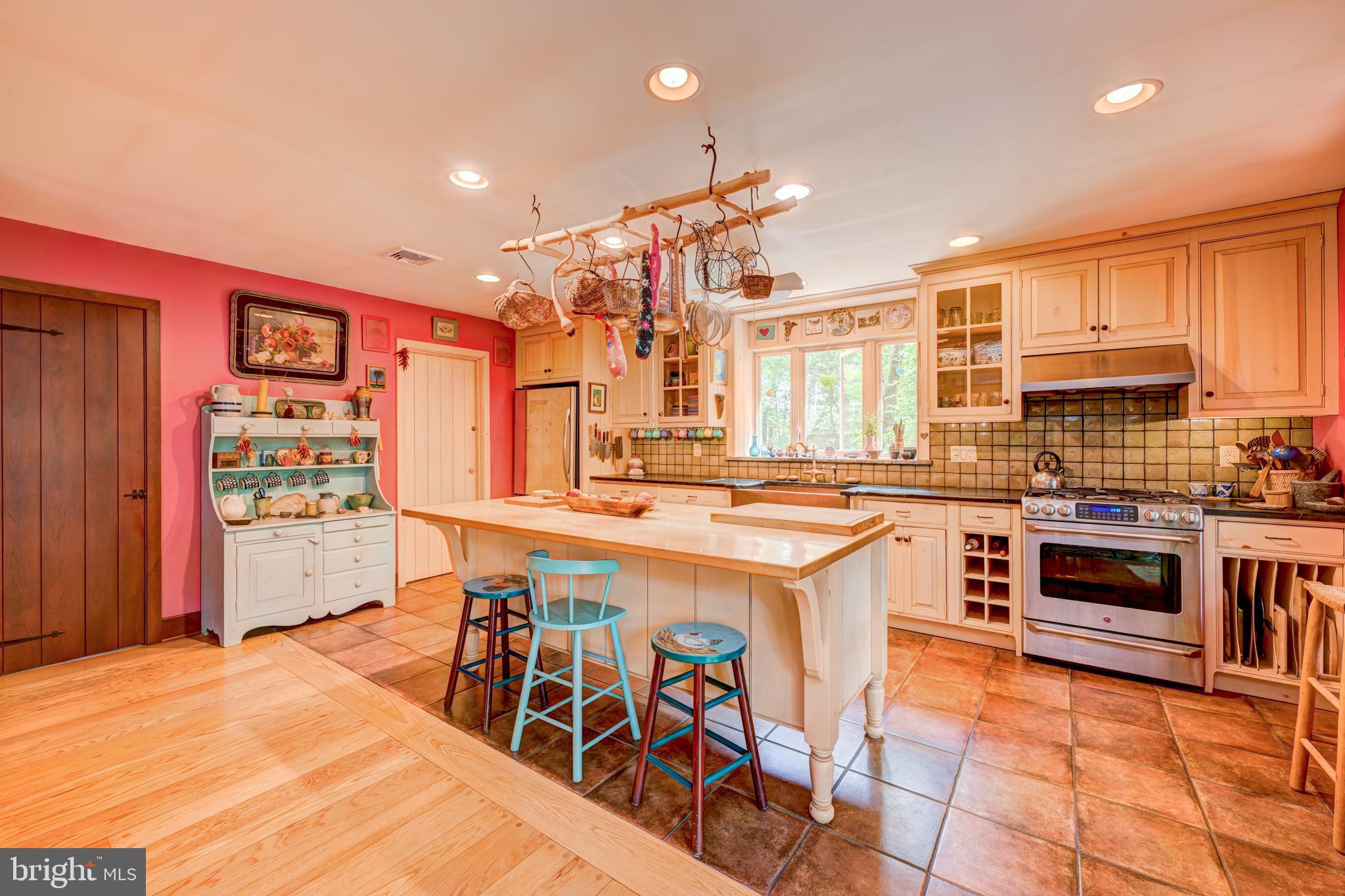 5613 Point Pleasant Pike Doylestown, PA 18902 - Photo 6 of 39 a very nice looking kitchen with stainless steel appliances kitchen island granite countertop a stove and a sink
